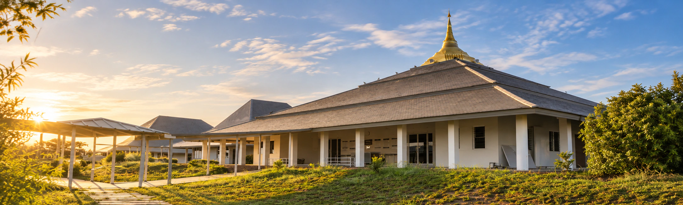 Pagoda and meditation hall at Dhamma Sudhalaya at sunrise